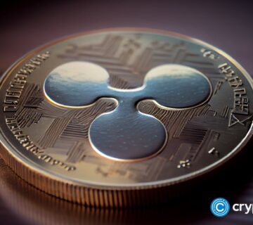 Crypto news cryptocurrency Ripple crypto Xrp Coin crypto coin with the image of Ripple XRP lies on the table 360x320