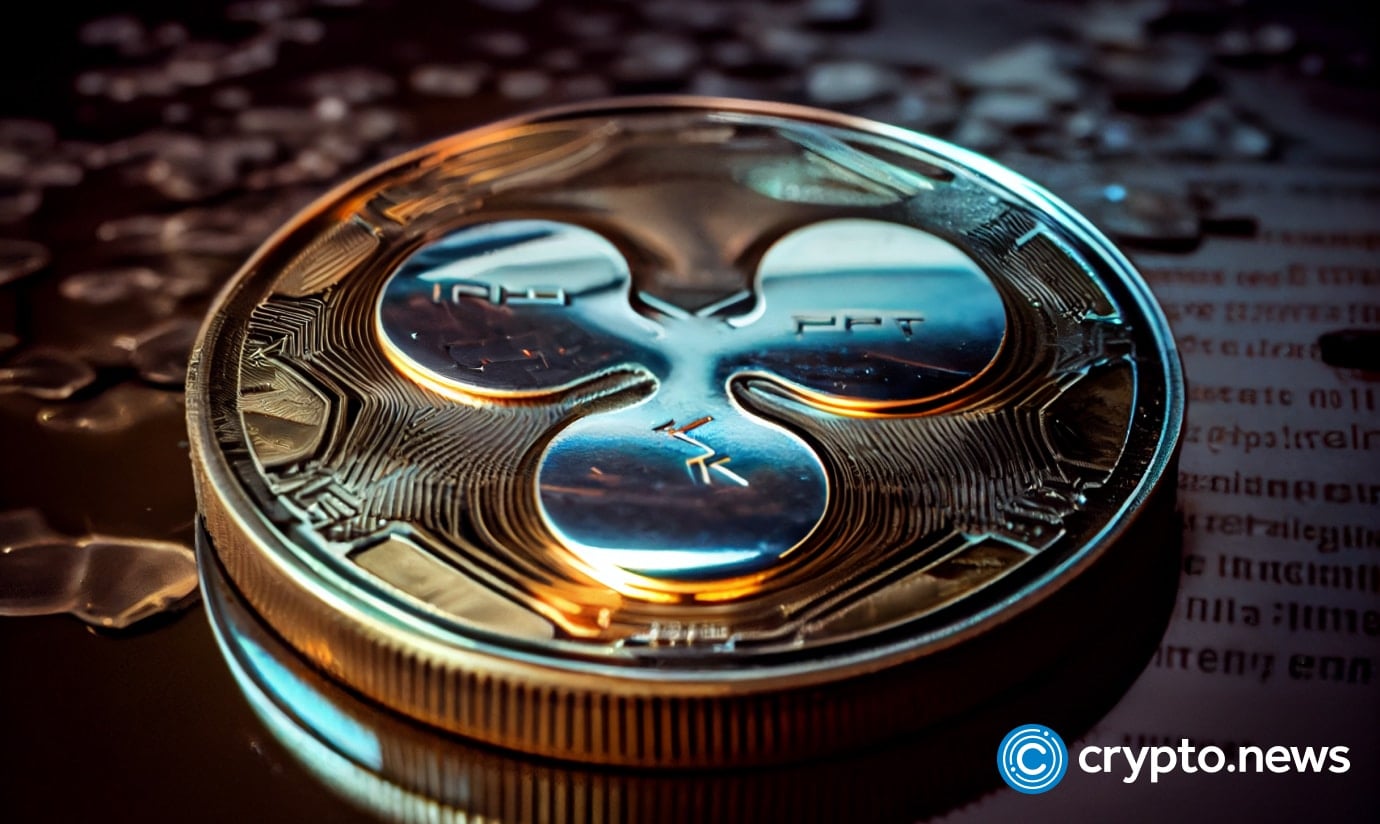 Crypto news cryptocurrency Ripple crypto Xrp Coin crypto coin with the image of Ripple XRP lies on the tabl