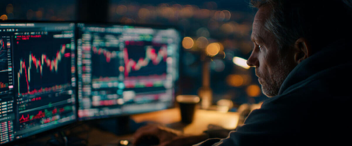 Trader at desk 1200x500